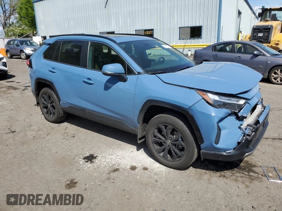 2024 Toyota RAV4 Hybrid SE with VIN JTM16RFV6RD147620, listed as a Copart auction lot 54415215 with 5,705 mi miles and Salvage title. Bid and sale history available at DreamBid. Image 4.