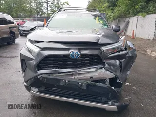 2022 Toyota RAV4 Hybrid SE with VIN JTM16RFV7ND067284, listed as a IAAI auction lot 42637821 with 20,512 mi miles and . Bid and sale history available at DreamBid. Image 12.