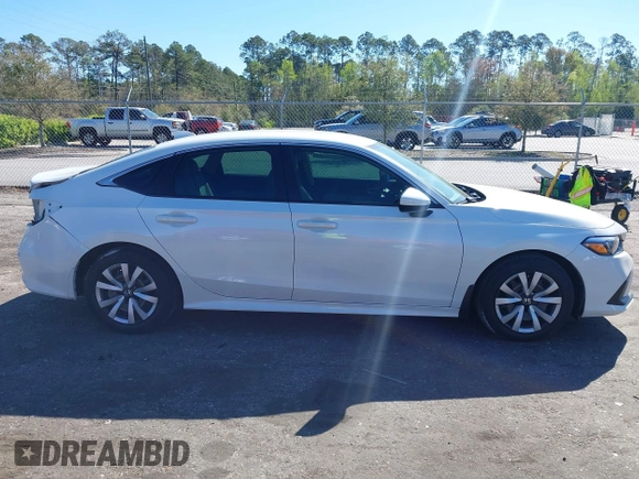 2022 Honda Civic Sedan LX with VIN 2HGFE2F26NH545818, listed as a IAAI auction lot 41817630 with 28,650 mi miles. Bid and sale history available at carsss.com. Image 13.