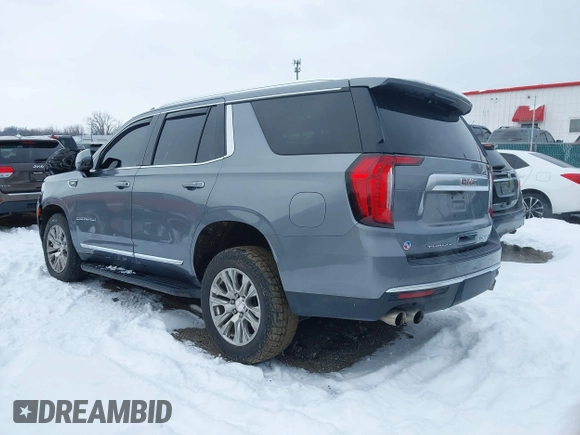 2021 GMC Yukon Denali with VIN 1GKS2DKL8MR216007, listed as a IAAI auction lot 41246785 with 83,058 mi miles. Bid and sale history available at carsss.com. Image 3.