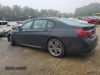 2019 BMW 7 Series 740i xDrive z VIN WBA7E4C52KGV28841, wystawiony jako Copart lot #56567375 z przebiegiem 162 220 mil mil oraz Szkody całkowita. Historia ofert i sprzedaży dostępna na DreamBid. Obrazek 2.