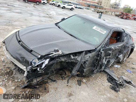 2014 Nissan 370Z Nismo z VIN JN1AZ4EH0EM634461, wystawiony jako Copart lot #53375685 z przebiegiem 171 858 mil mil oraz Szkoda całkowita • Salvage title. Historia ofert i sprzedaży dostępna na DreamBid. Obrazek 1.