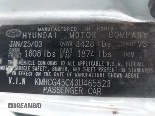 2003 Hyundai Accent GL with VIN KMHCG45C43U465523, listed as a IAAI auction lot 40883056 with 95,770 mi miles. Bid and sale history available at carsss.com. Image 9.