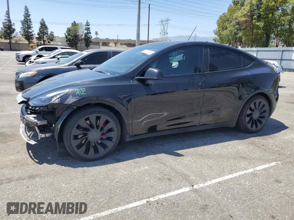 2022 Tesla Model Y Performance z VIN 7SAYGDEF2NF443037, wystawiony jako Copart lot #56870145 z przebiegiem 51 897 mil mil oraz Szkoda całkowita • Salvage title. Historia ofert i sprzedaży dostępna na DreamBid. Obrazek 1.