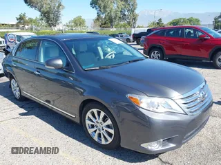 2011 Toyota Avalon with VIN 4T1BK3DBXBU432313, listed as a IAAI auction lot 42694371 with 54,240 mi miles and . Bid and sale history available at DreamBid. Image 1.
