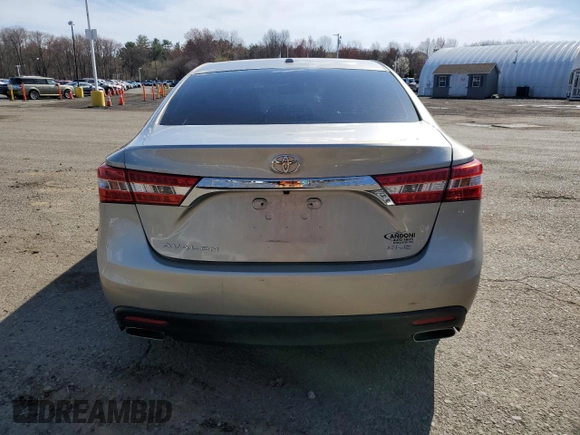 2014 Toyota Avalon Limited with VIN 4T1BK1EB4EU080093, listed as a Copart auction lot 54106595 with 108,995 mi miles and Salvage Title. Bid and sale history available at DreamBid. Image 6.