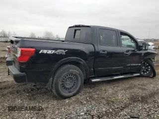 2018 Nissan Titan Pro-4X z VIN 1N6AA1E58JN523036, wystawiony jako Copart lot #45383075 z przebiegiem 153 047 mil mil oraz Czysty tytuł • Clean title. Historia ofert i sprzedaży dostępna na DreamBid. Obrazek 3.
