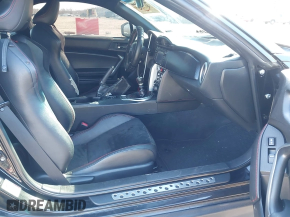 2014 Scion FR-S z VIN JF1ZNAA14E9708590, wystawiony jako IAAI lot #41278089 z przebiegiem 117 357 mil mil oraz . Historia ofert i sprzedaży dostępna na DreamBid. Obrazek 5.