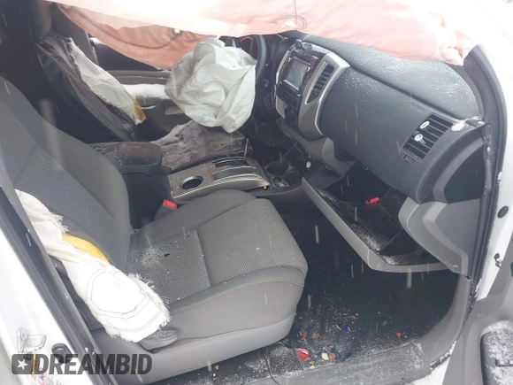 2015 Toyota Tacoma with VIN 3TMLU4EN8FM200529, listed as a IAAI auction lot 41602598 with 98,456 mi miles and . Bid and sale history available at DreamBid. Image 5.