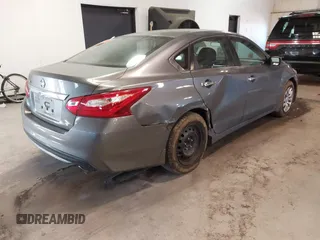 2016 Nissan Altima SV with VIN 1N4AL3AP5GC177327, listed as a IAAI auction lot 41357392 with 114,544 mi miles and . Bid and sale history available at DreamBid. Image 4.
