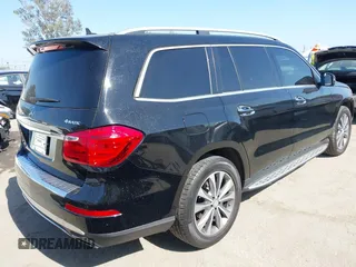 2014 Mercedes-Benz GL 450 with VIN 4JGDF7CE7EA414390, listed as a IAAI auction lot 42554915 with 114,997 mi miles and . Bid and sale history available at DreamBid. Image 4.