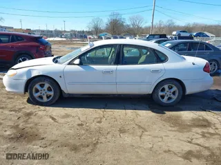 2001 Ford Taurus SES with VIN 1FAFP55231A243171, listed as a IAAI auction lot 41429890 with 131,537 mi miles. Bid and sale history available at carsss.com. Image 14.