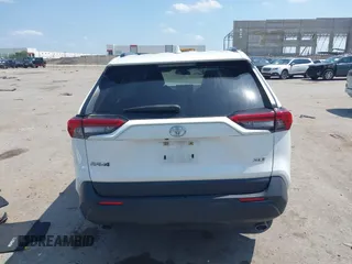 2021 Toyota RAV4 XLE with VIN JTMW1RFV2MD063839, listed as a IAAI auction lot 42406891 with 69,490 mi miles and . Bid and sale history available at DreamBid. Image 16.