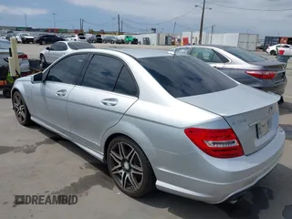 2014 Mercedes-Benz C-Class C 250 Sport with VIN WDDGF4HB0EG216428, listed as a IAAI auction lot 42148809 with 132,113 mi miles. Bid and sale history available at carsss.com. Image 3.