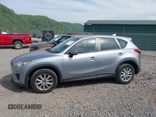 2014 Mazda CX-5 Sport with VIN JM3KE2BE9E0423737, listed as a IAAI auction lot 42222646 with 116,160 mi miles and . Bid and sale history available at DreamBid. Image 14.
