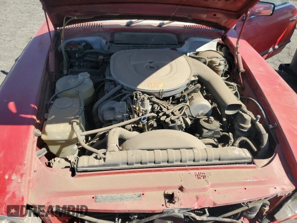 1985 Mercedes-Benz SL with VIN WDBBA45C9FA017476, listed as a Copart auction lot 74177774 with 135,805 mi miles and Salvage title. Bid and sale history available at DreamBid. Image 11.