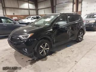 2017 Toyota RAV4 XLE with VIN 2T3RFREV0HW669312, listed as a IAAI auction lot 41410721 with 99,404 mi miles. Bid and sale history available at carsss.com. Image 2.