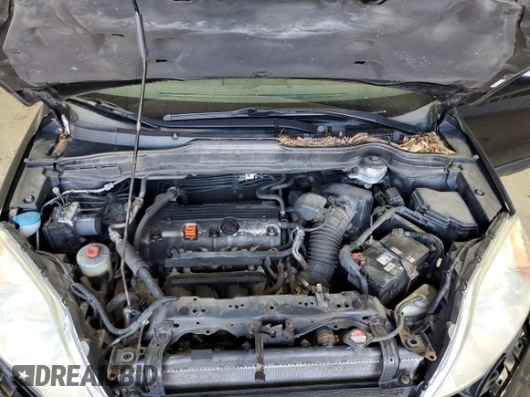 2010 Honda CR-V EX-L z VIN 5J6RE4H77AL060093, wystawiony jako Copart lot #54194545 z przebiegiem 175 633 mil mil oraz Szkoda całkowita • Salvage title. Historia ofert i sprzedaży dostępna na DreamBid. Obrazek 12.
