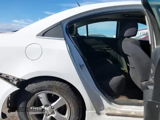 2014 Chevrolet Cruze 1LT z VIN 1G1PC5SB5E7190497, wystawiony jako IAAI lot #41399147 z przebiegiem 159 724 mil mil oraz . Historia ofert i sprzedaży dostępna na DreamBid. Obrazek 8.