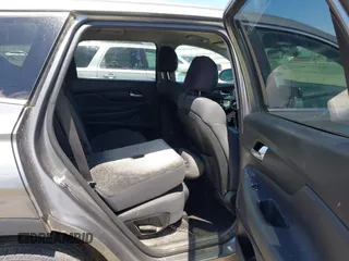 2019 Hyundai Santa Fe SE with VIN 5NMS23AD3KH083786, listed as a IAAI auction lot 42196828 with Not Provided miles and . Bid and sale history available at DreamBid. Image 8.