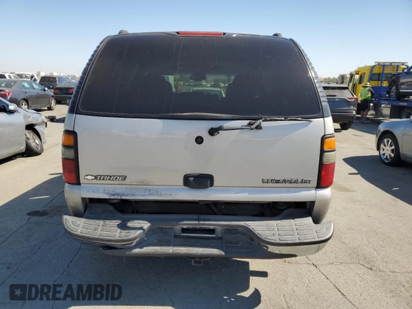 2005 Chevrolet Tahoe LT with VIN 1GNEC13T35R103206, listed as a Copart auction lot 74310784 with 128,780 mi miles and Salvage Title. Bid and sale history available at carsss.com. Image 6.