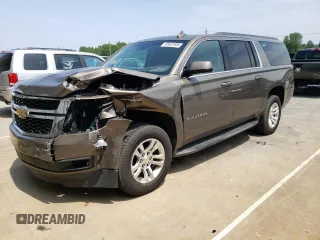 2015 Chevrolet Suburban LS with VIN 1GNSCHKC8FR628406, listed as a Copart auction lot 60682805 with 195,151 mi miles and Salvage title. Bid and sale history available at DreamBid. Image 1.