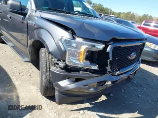 2018 Ford F-150 XL with VIN 1FTEW1C50JFD23545, listed as a IAAI auction lot 41838209 with 129,906 mi miles and . Bid and sale history available at DreamBid. Image 17.