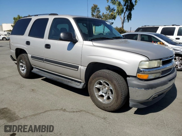 2005 Chevrolet Tahoe LT with VIN 1GNEC13T35R103206, listed as a Copart auction lot 74310784 with 128,780 mi miles and Salvage Title. Bid and sale history available at carsss.com. Image 4.