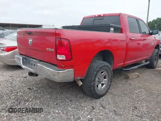 2015 Ram 2500 SLT with VIN 3C6TR5DT2FG576205, listed as a IAAI auction lot 42173472 with 334,933 mi miles. Bid and sale history available at carsss.com. Image 4.