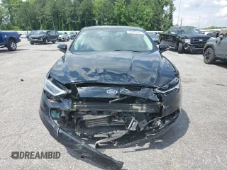2017 Ford Fusion SE z VIN 3FA6P0H92HR150296, wystawiony jako Copart lot #57075385 z przebiegiem 135 304 mil mil oraz Szkoda całkowita • Salvage title. Historia ofert i sprzedaży dostępna na DreamBid. Obrazek 5.