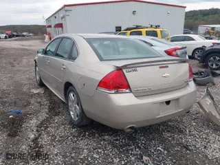 2012 Chevrolet Impala LT Retail with VIN 2G1WB5E38C1139881, listed as a IAAI auction lot 41922693 with 121,887 mi miles. Bid and sale history available at carsss.com. Image 3.
