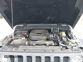 2021 Jeep Wrangler Sport z VIN 1C4GJXAN3MW550665, wystawiony jako IAAI lot #41902279 z przebiegiem 32 250 mil mil oraz . Historia ofert i sprzedaży dostępna na DreamBid. Obrazek 10.