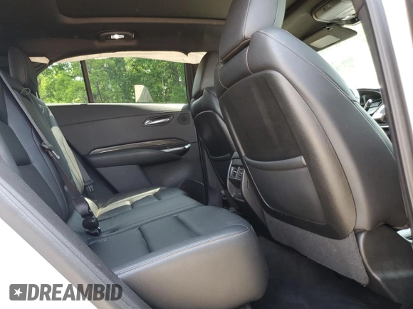 2023 Cadillac XT4 AWD Sport с VIN 1GYFZFR46PF209320, выставлен на аукционе Copart как лот 55662565 с пробегом 25 665 миль миль и Списание • Salvage title. История ставок и продаж доступна на DreamBid. Изображение 11.