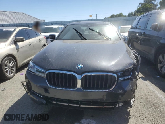2023 BMW 5 Series 530e with VIN WBA13AG00PCL24045, listed as a Copart auction lot 84961634 with Not provided miles and Salvage title. Bid and sale history available at DreamBid. Image 5.
