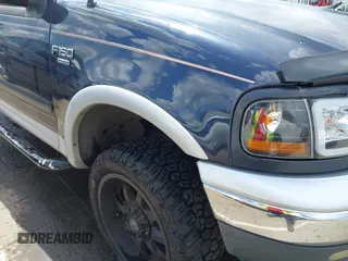 2001 Ford F-150 XLT z VIN 1FTRW08LX1KD56482, wystawiony jako IAAI lot #42155153 z przebiegiem 340 009 mil mil oraz . Historia ofert i sprzedaży dostępna na DreamBid. Obrazek 18.