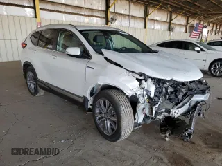 2022 Honda CR-V Touring z VIN 5J6RT6H90NL053771, wystawiony jako Copart lot #51276025 z przebiegiem Nie podano mil oraz Szkoda całkowita • Salvage title. Historia ofert i sprzedaży dostępna na DreamBid. Obrazek 4.