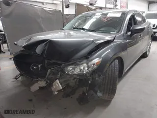 2017 Mazda Mazda6 Touring with VIN JM1GL1V5XH1146167, listed as a IAAI auction lot 41398814 with 59,590 mi miles. Bid and sale history available at carsss.com. Image 2.