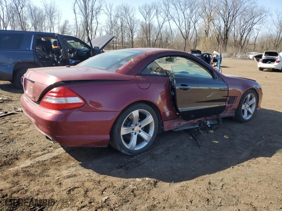 2009 Mercedes-Benz SL-Class V8 with VIN WDBSK71F29F142731, listed as a Copart auction lot 47820935 with 109,911 mi miles and Salvage Title. Bid and sale history available at carsss.com. Image 3.