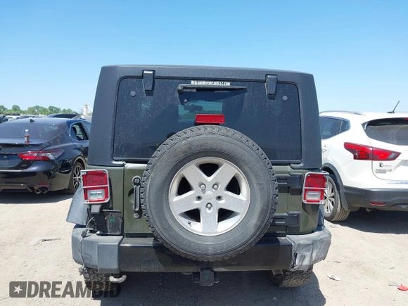 2015 Jeep Wrangler Sport with VIN 1C4AJWAGXFL650428, listed as a IAAI auction lot 42010629 with 80,039 mi miles. Bid and sale history available at carsss.com. Image 16.