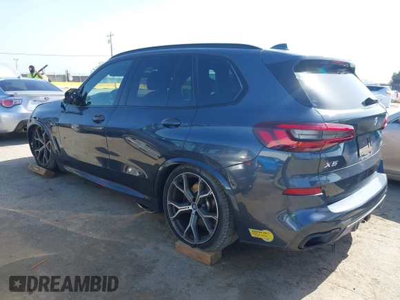2022 BMW X5 xDrive45e with VIN 5UXTA6C07N9J29881, listed as a IAAI auction lot 42086373 with 63,510 mi miles and . Bid and sale history available at DreamBid. Image 3.