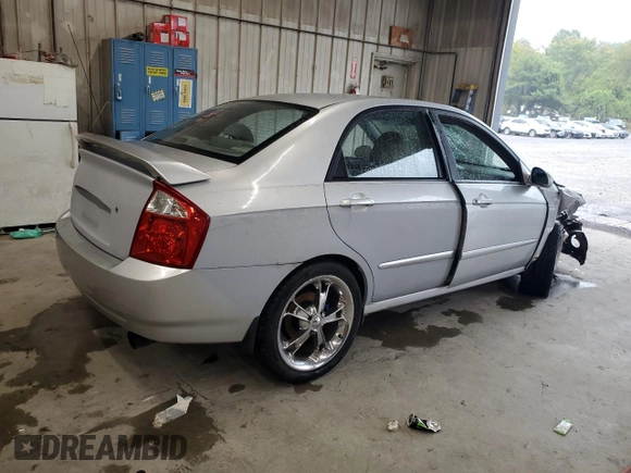2006 Kia Spectra EX with VIN KNAFE121565357402, listed as a Copart auction lot 72889614 with 200,657 mi miles and Salvage Title. Bid and sale history available at carsss.com. Image 3.