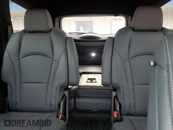 2023 Buick Enclave Premium with VIN 5GAEVBKW6PJ263815, listed as a Copart auction lot 54877715 with 14,983 mi miles and Salvage Title. Bid and sale history available at DreamBid. Image 10.