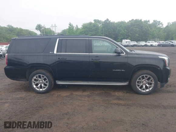 2015 GMC Yukon XL SLT z VIN 1GKS2HKC1FR146778, wystawiony jako IAAI lot #42449315 z przebiegiem 197 577 mil mil oraz . Historia ofert i sprzedaży dostępna na DreamBid. Obrazek 13.