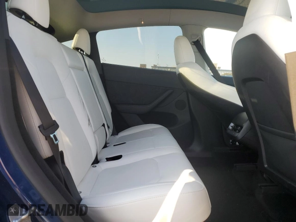 2023 Tesla Model Y Long Range with VIN 7SAYGDEE7PA146322, listed as a Copart auction lot 54071165 with 38,334 mi miles and Salvage Title. Bid and sale history available at DreamBid. Image 10.
