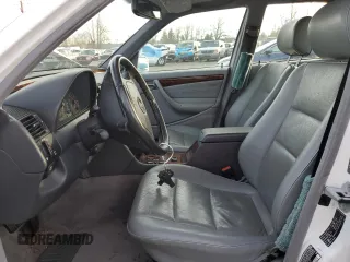 2000 Mercedes-Benz C 230 Kompressor with VIN WDBHA24G7YA822415, listed as a Copart auction lot 44250475 with 180,311 mi miles and Salvage Title. Bid and sale history available at carsss.com. Image 7.