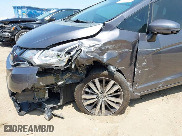 2015 Honda Fit EX-L with VIN 3HGGK5H84FM764084, listed as a IAAI auction lot 42321647 with 82,819 mi miles and . Bid and sale history available at DreamBid. Image 6.
