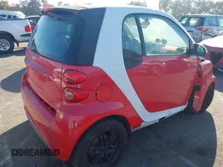 2014 Smart fortwo Pure with VIN WMEEJ3BA0EK757200, listed as a IAAI auction lot 41681977 with 99,245 mi miles and . Bid and sale history available at DreamBid. Image 4.