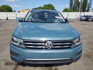 2021 Volkswagen Tiguan SE z VIN 3VV3B7AX6MM041166, wystawiony jako Copart lot #57769445 z przebiegiem 51 030 mil mil oraz Nie do naprawy • Non repairable. Historia ofert i sprzedaży dostępna na DreamBid. Obrazek 5.