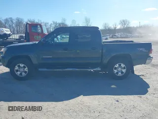 2009 Toyota Tacoma z VIN 3TMLU42N79M027935, wystawiony jako IAAI lot #41645051 z przebiegiem 341 601 mil mil oraz . Historia ofert i sprzedaży dostępna na DreamBid. Obrazek 14.