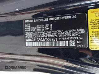 2018 BMW 2 Series 230i with VIN WBA2J1C50JVD09751, listed as a IAAI auction lot 41440752 with 71,700 mi miles. Bid and sale history available at carsss.com. Image 9.